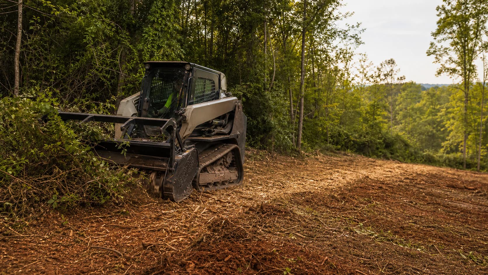 Land clearing equipment opening a Georgia property